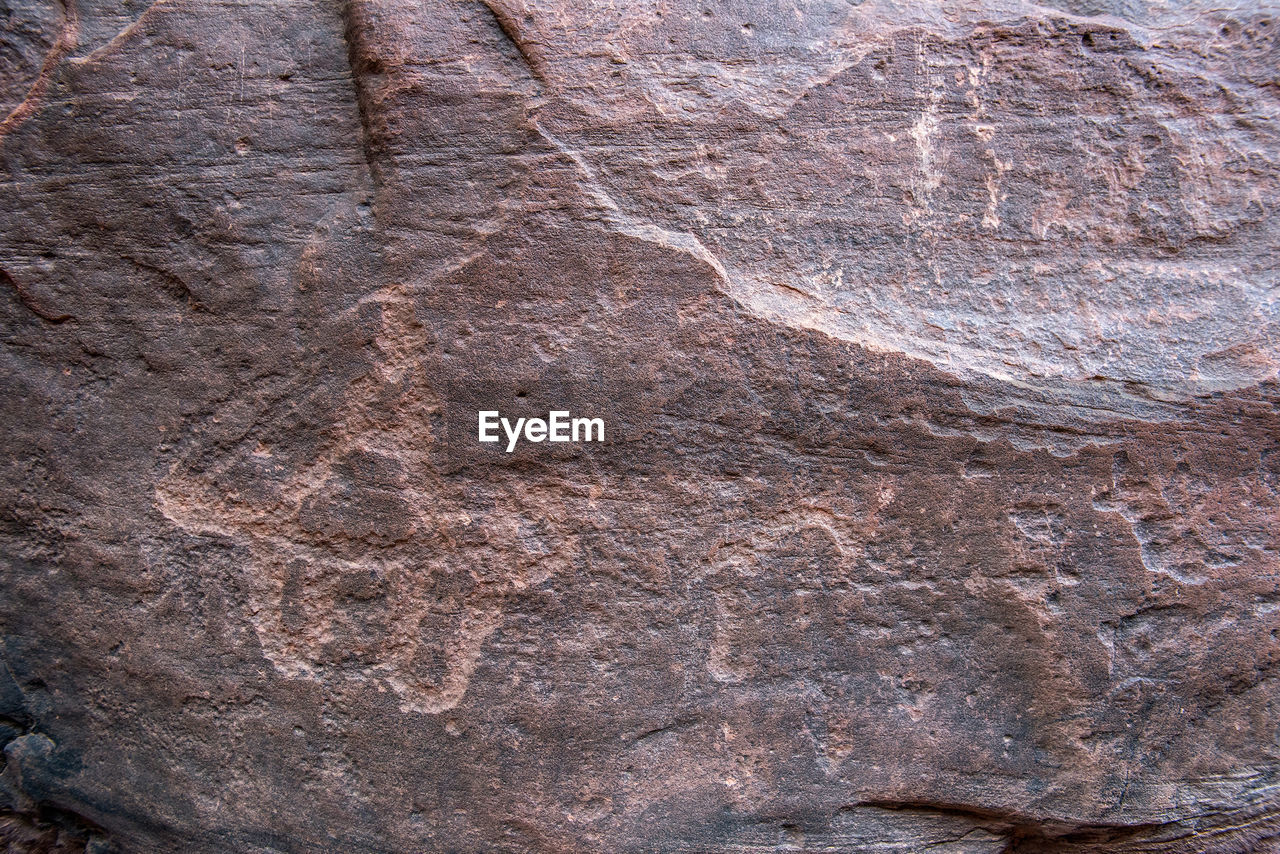 FULL FRAME SHOT OF ROCK ON GROUND