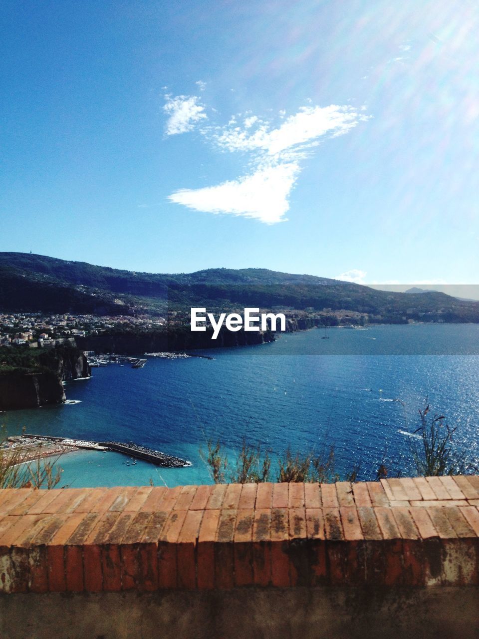 SCENIC VIEW OF RIVER AND MOUNTAINS AGAINST SKY