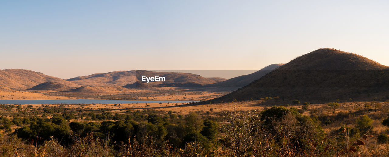 Scenic view of mountains against clear sky