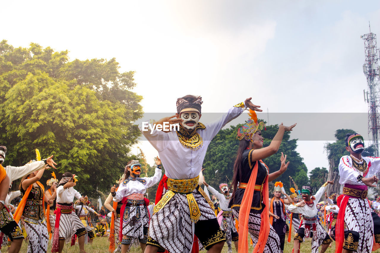 Colossal topeng dance performed by thousands of dancers in the wonosobo square