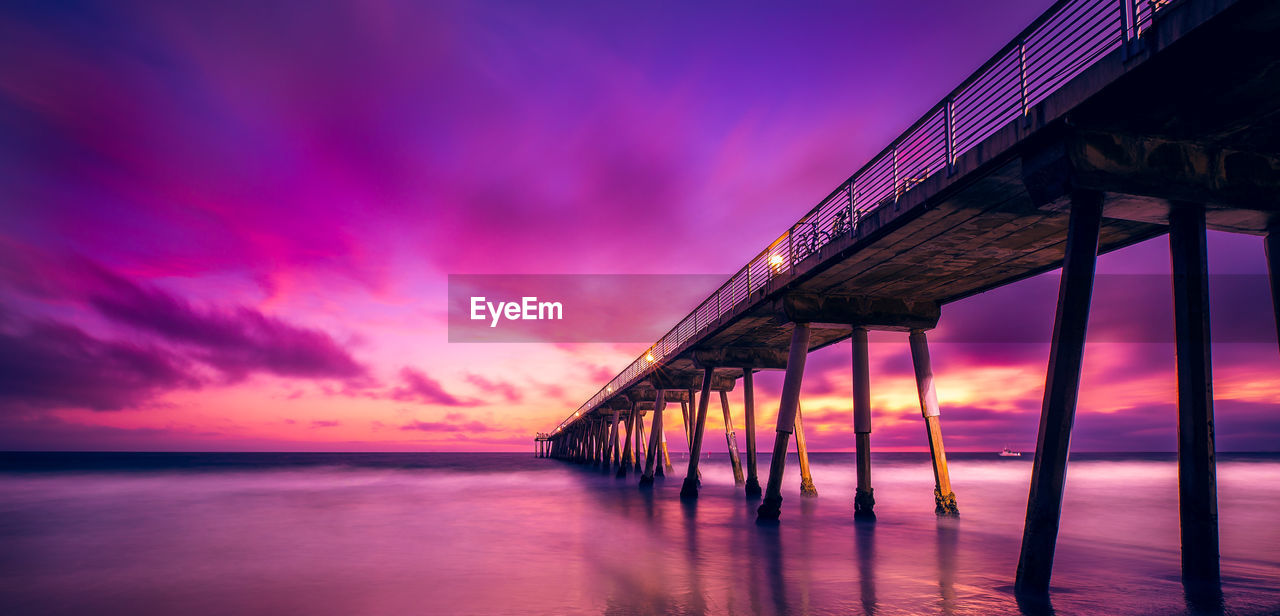 Twilight light after the sun went over the horizon at the hermosa beach pier.