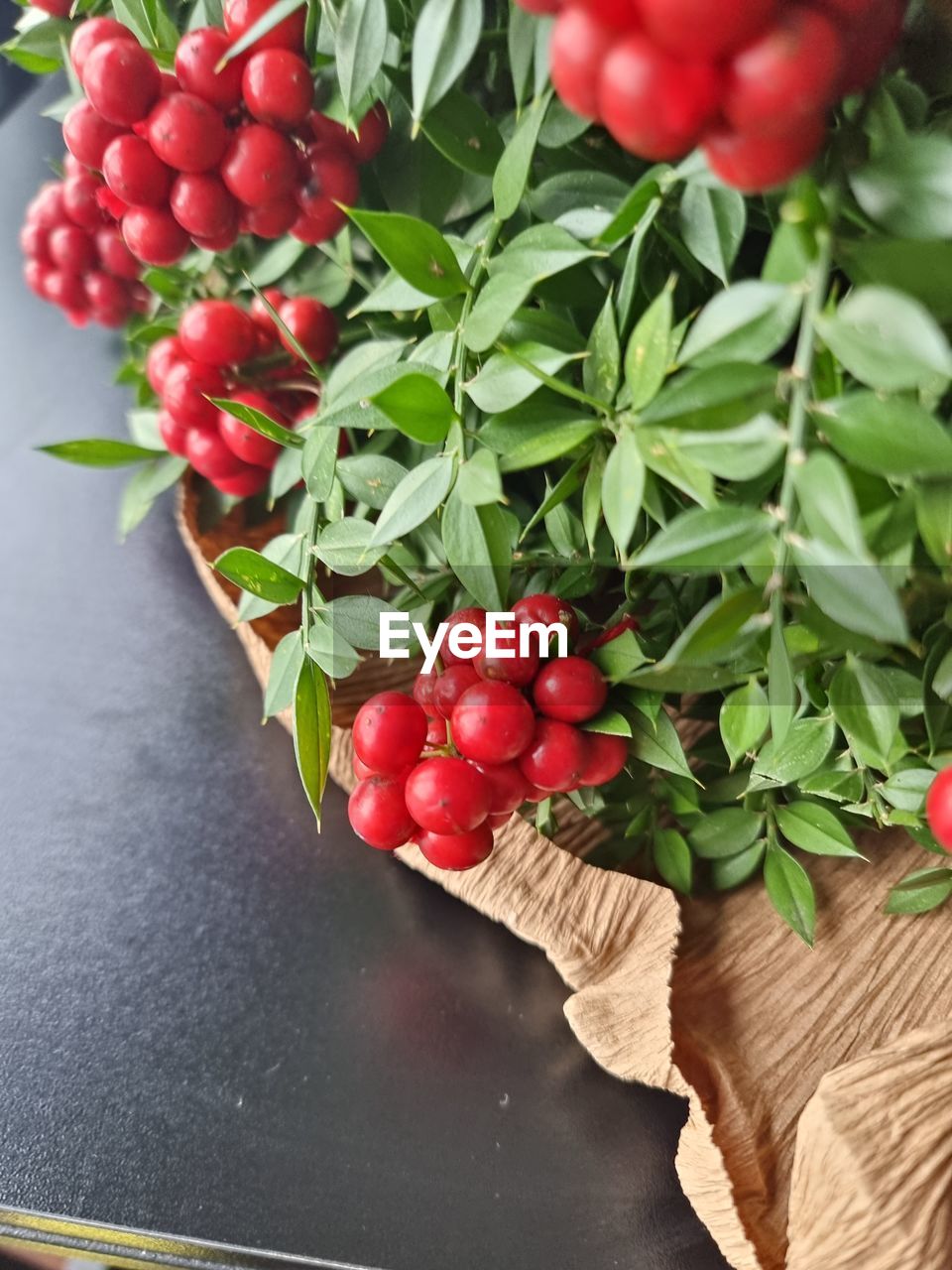 food and drink, food, healthy eating, fruit, plant, freshness, wellbeing, red, produce, leaf, plant part, vegetable, flower, no people, tomato, nature, indoors, green, organic, close-up, berry, juicy, high angle view