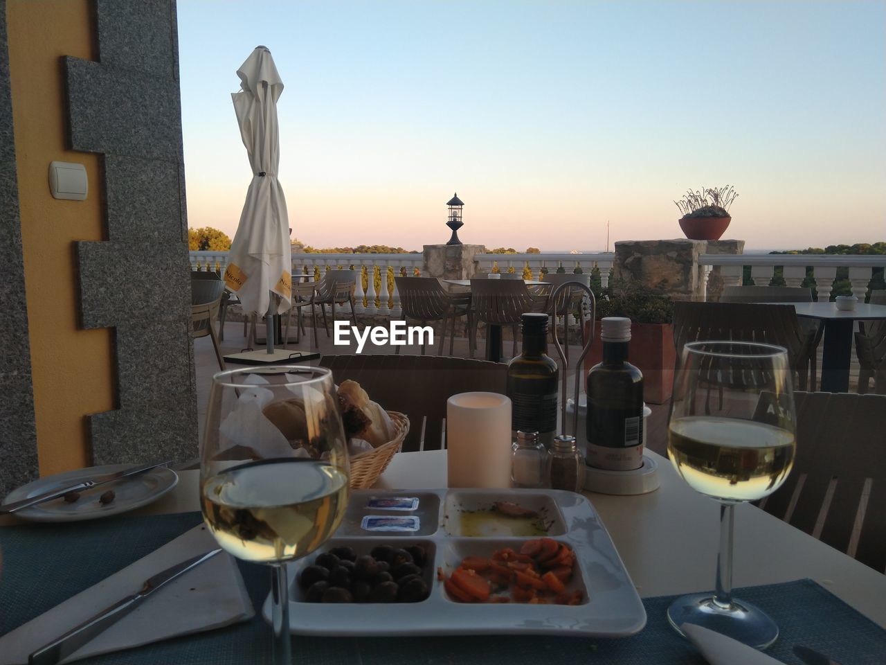 FOOD ON TABLE AT SUNSET