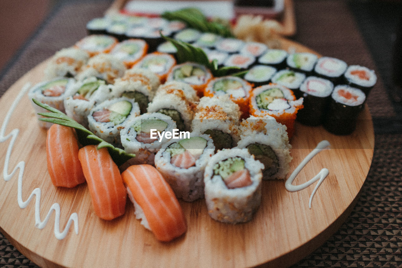 CLOSE-UP OF SUSHI ON TABLE