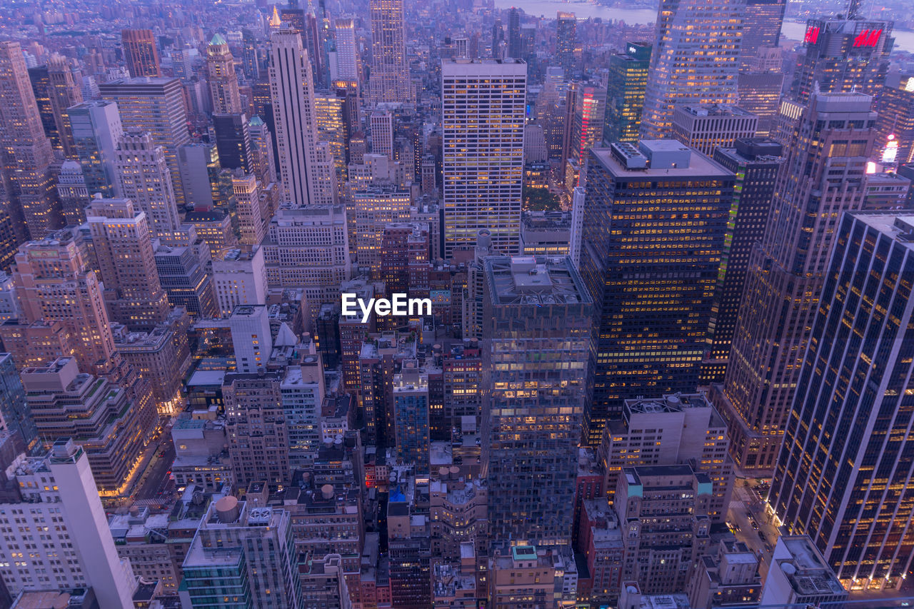 Aerial view of cityscape at dusk