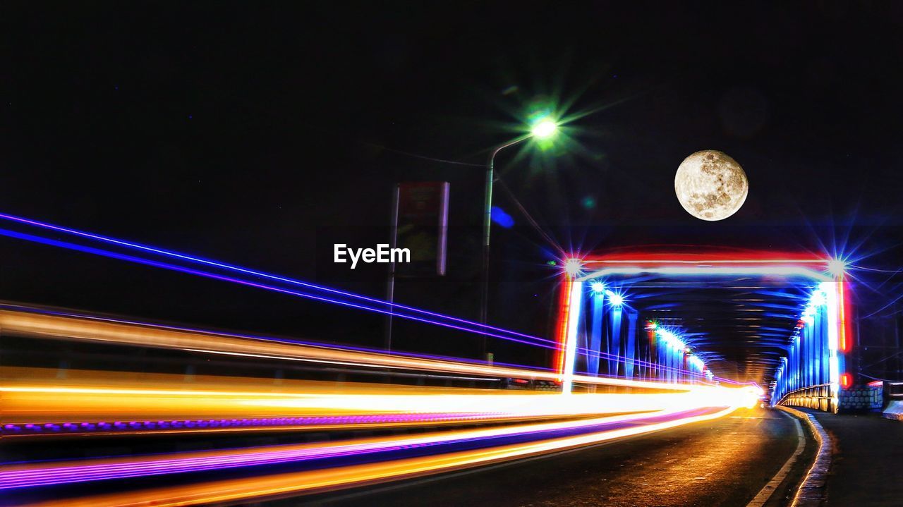 Light trails on road at night