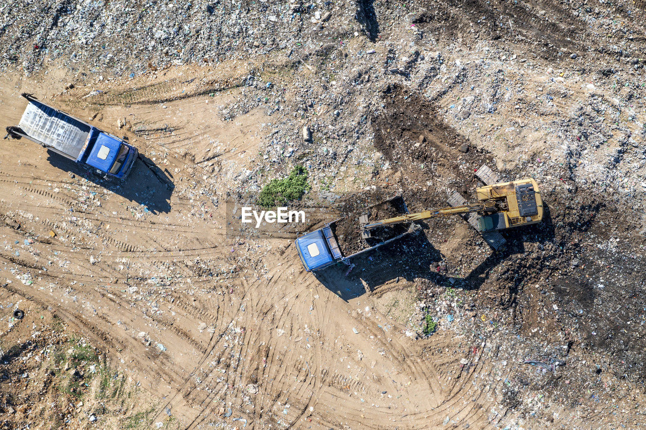 high angle view of water bottle on field