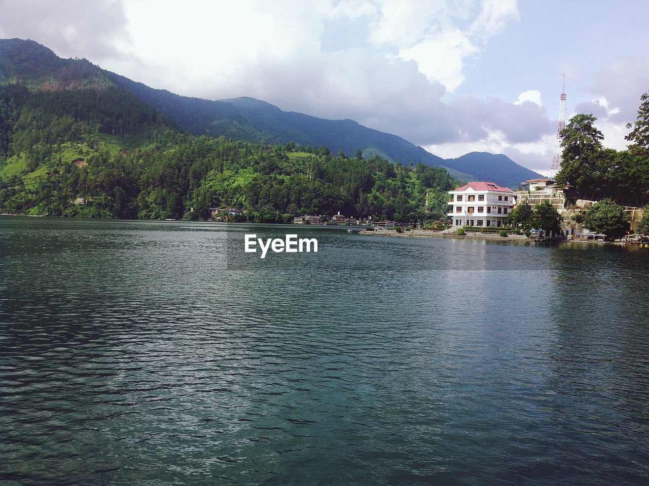 SCENIC VIEW OF RIVER AND MOUNTAINS