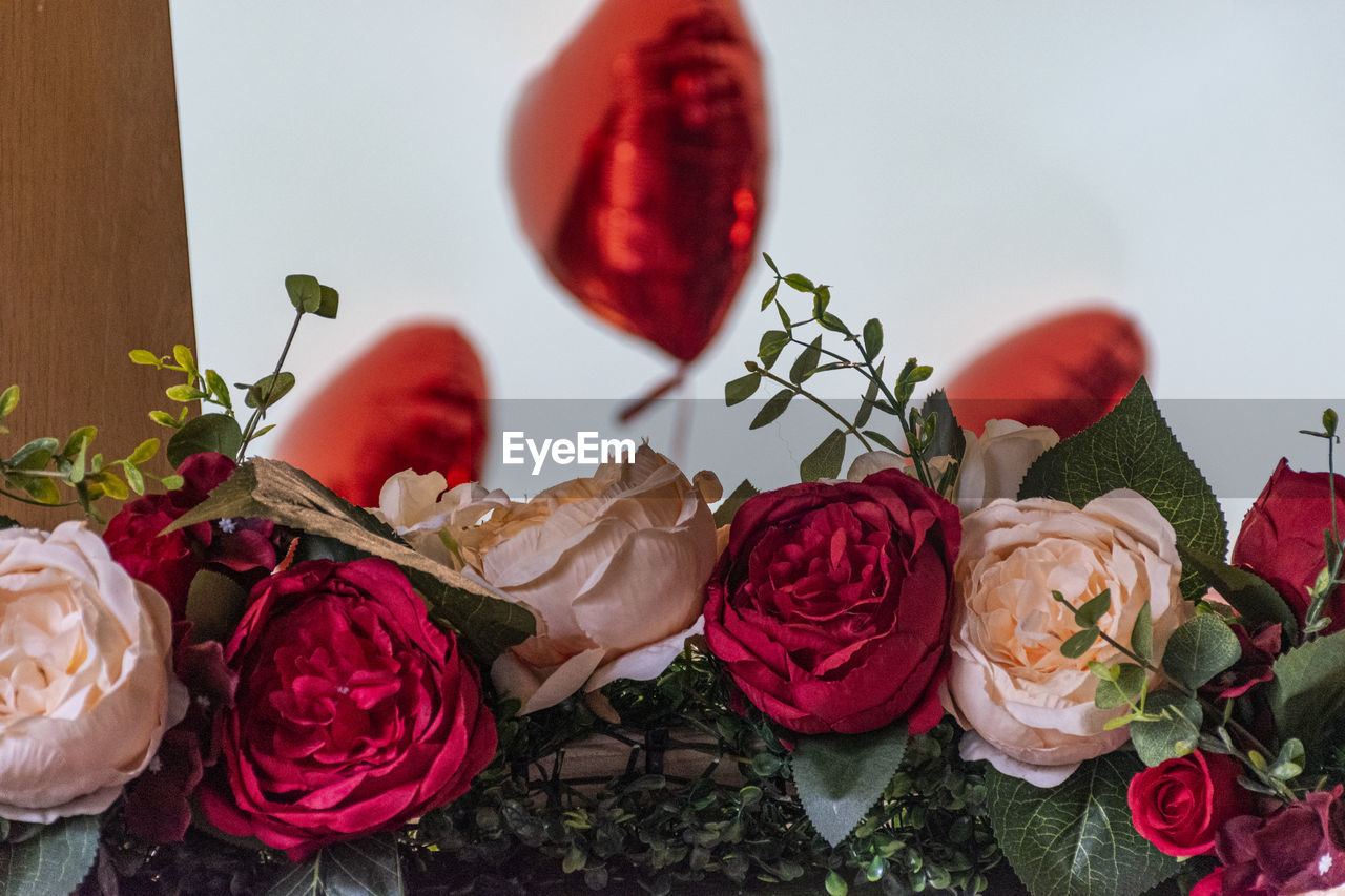 Close-up of roses on table