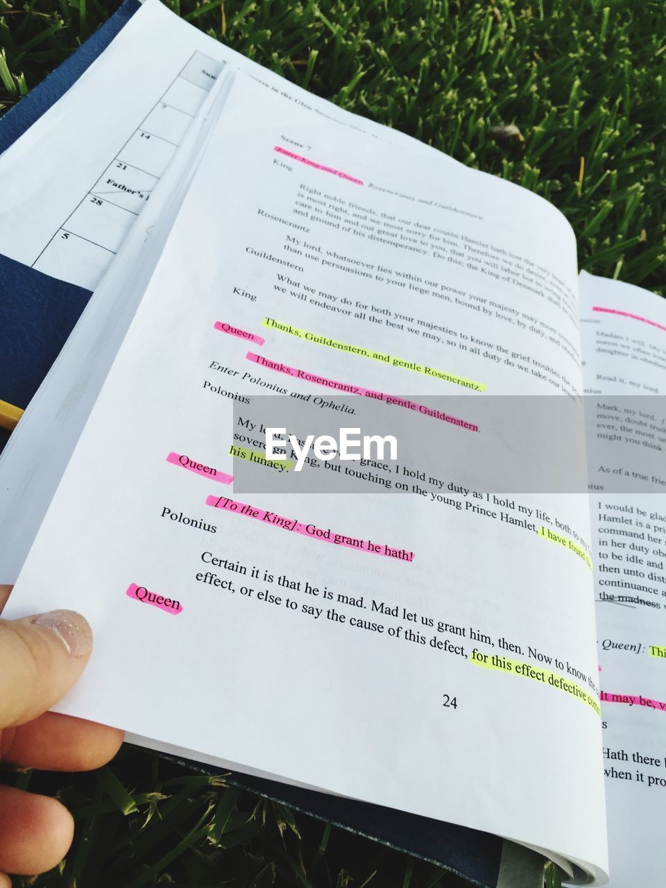 CROPPED IMAGE OF WOMAN WRITING ON BOOK