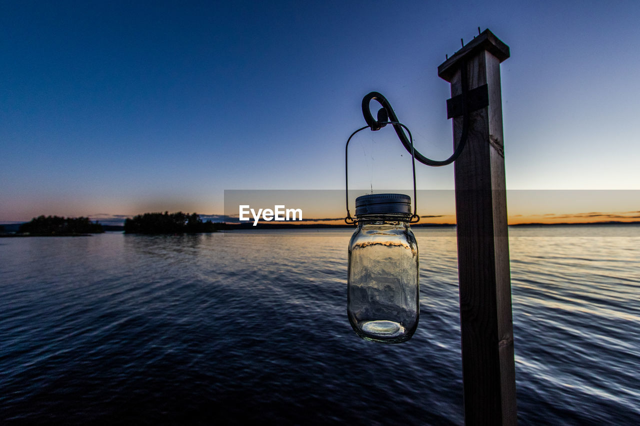 View of sea against clear sky during sunset