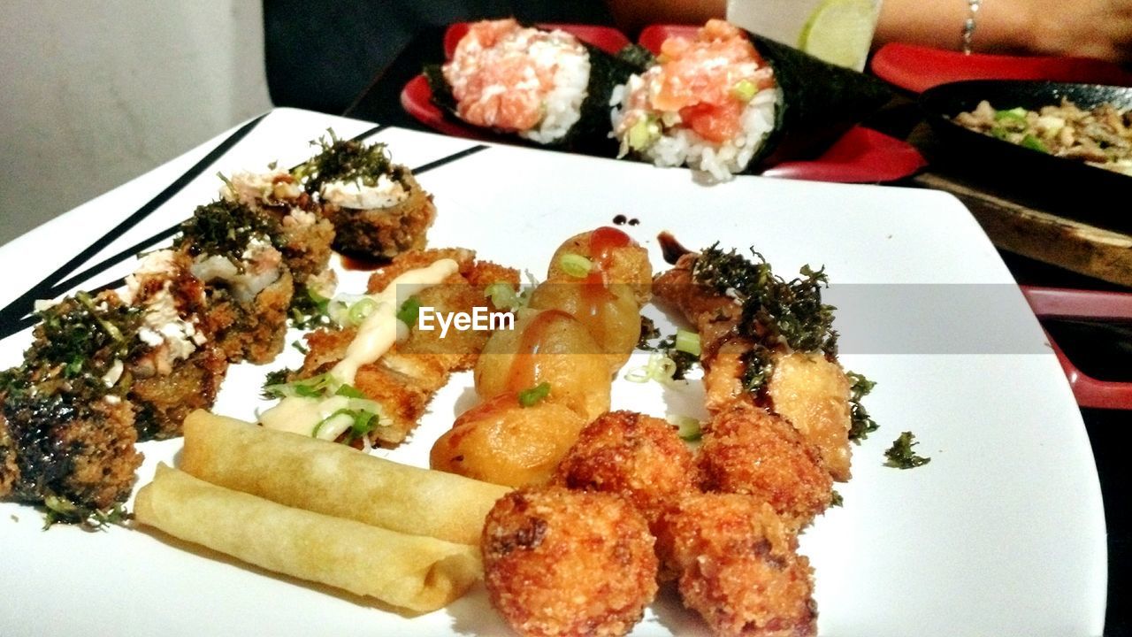 CLOSE-UP OF SERVED FOOD IN PLATE