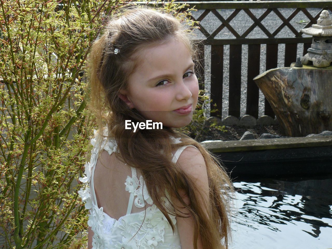 Portrait of girl standing outdoors