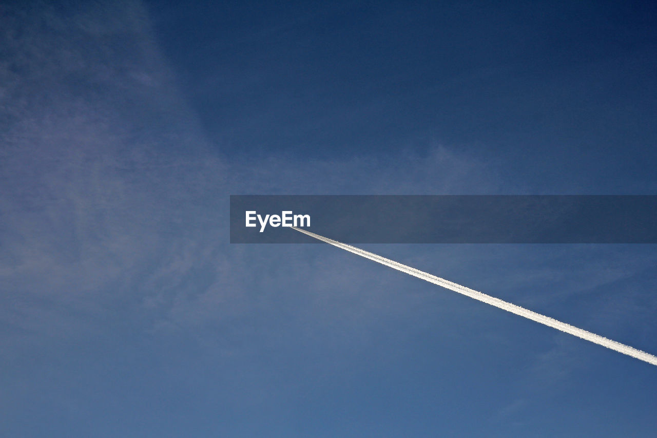 Low angle view of vapor trail in sky