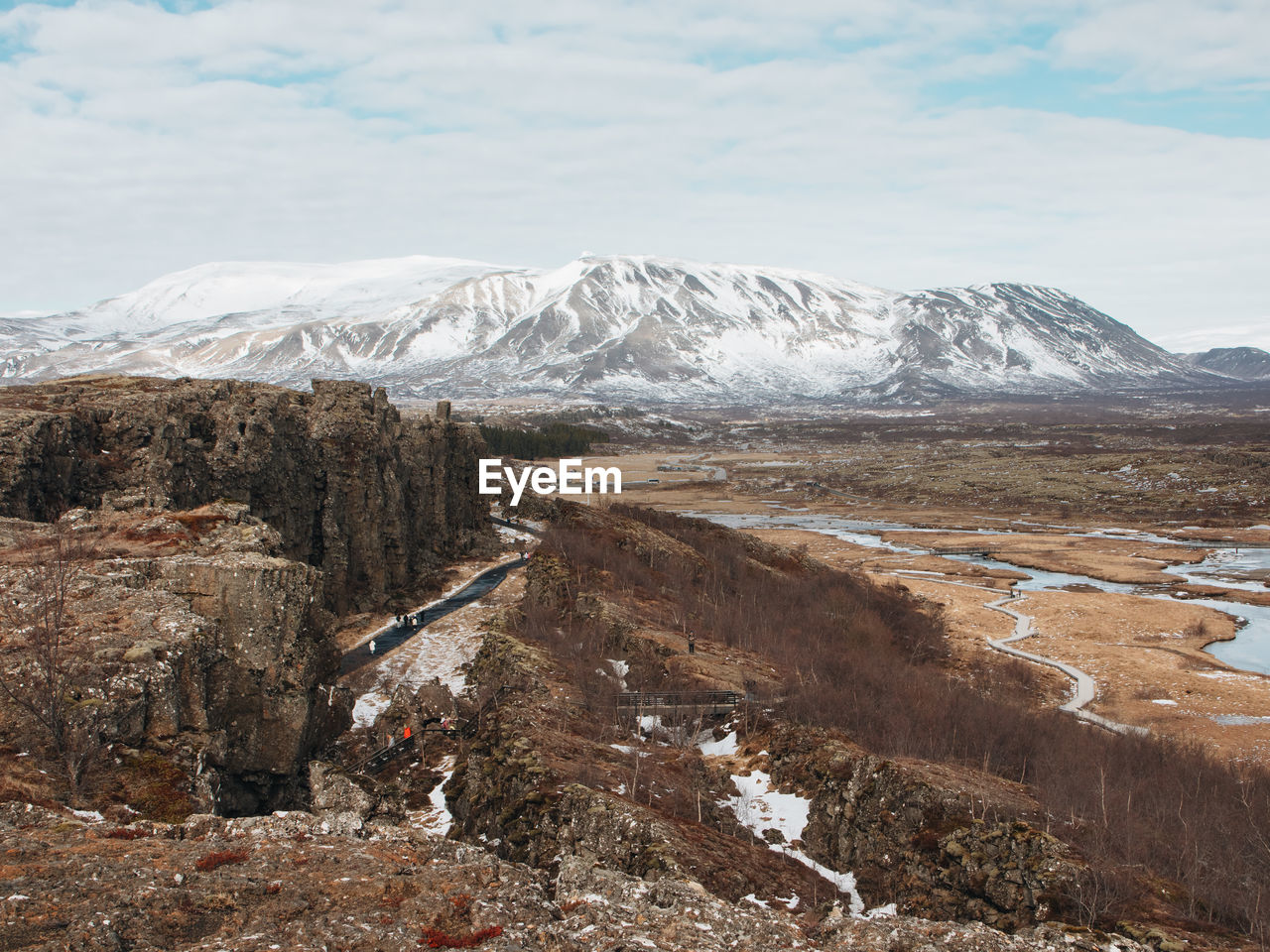 snow, mountain, environment, cold temperature, landscape, winter, scenics - nature, beauty in nature, sky, cloud, nature, snowcapped mountain, wilderness, non-urban scene, geology, travel destinations, no people, tranquility, tranquil scene, day, ridge, mountain range, land, travel, plateau, outdoors, volcano, physical geography, tourism, ice, moraine, idyllic, remote, frozen, extreme terrain