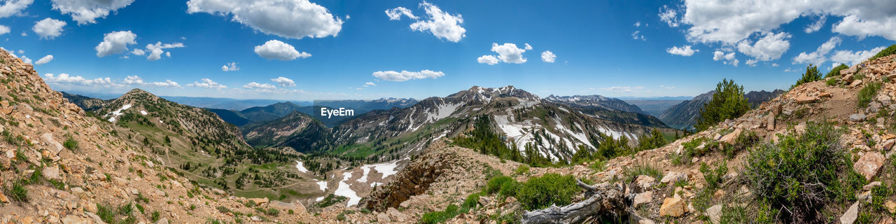 Looking towards Snowbird Ski and Summer Resort Little Cottonwood Canyon Snowbird Salt Lake City Utah Blue Sky And Clouds Wasatch Mountains No People Snow Summertime Ski Resort  Skiing Rocky Mountains Tranquility Hiking Panorama