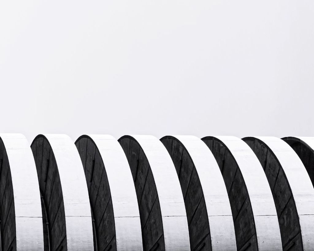 WOODEN POSTS IN THE SEA