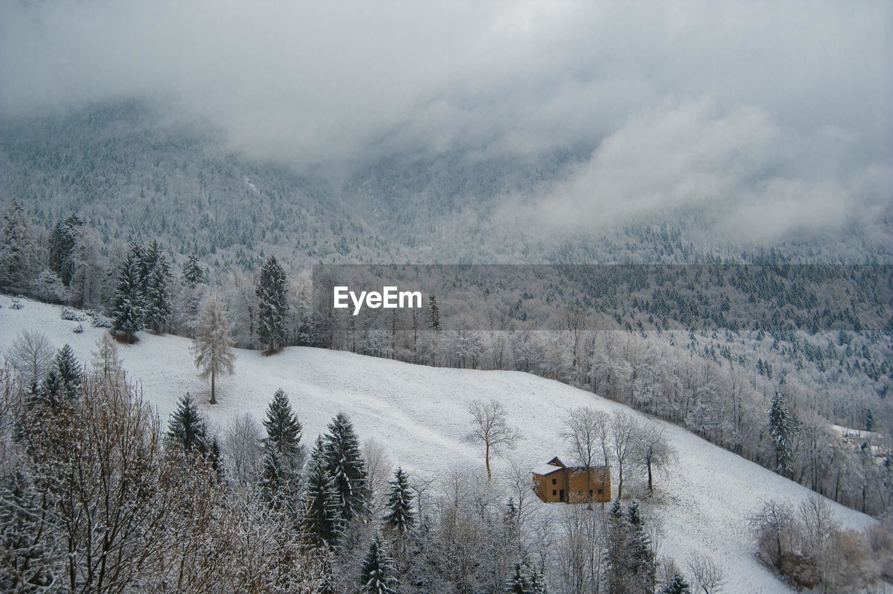 Scenic view of snowcapped mountains during winter