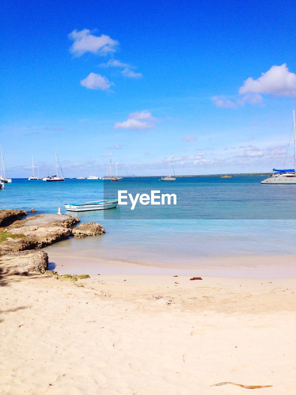 View of boats in sea from beach