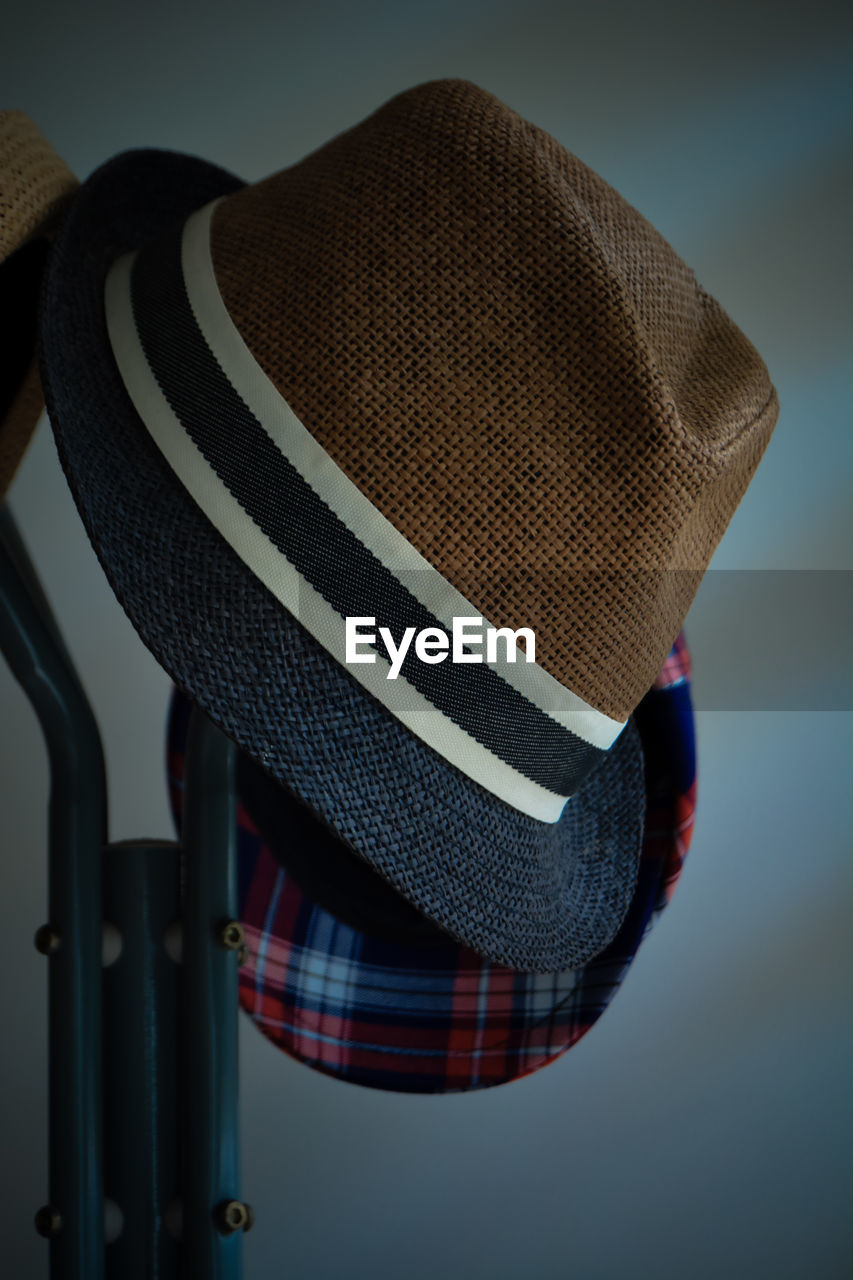 hat, clothing, fashion accessory, cap, headgear, sun hat, indoors, pattern, studio shot, close-up, no people