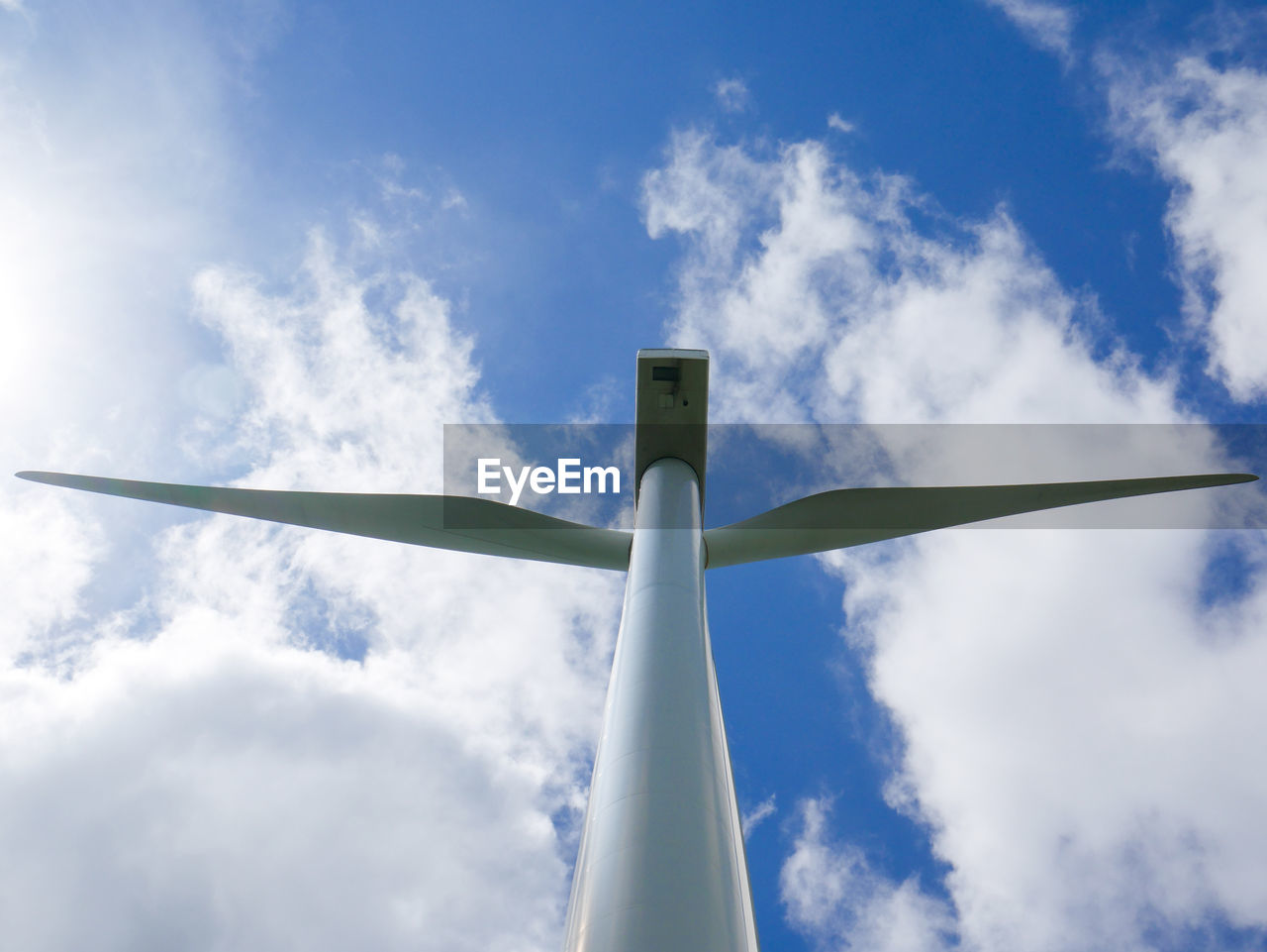 LOW ANGLE VIEW OF WINDMILLS AGAINST SKY