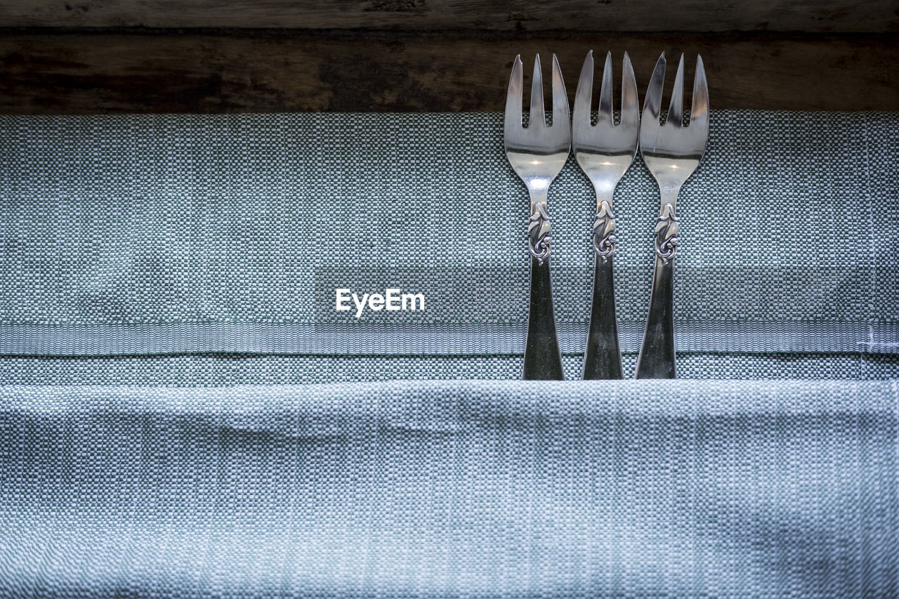 Close-up of fork on table