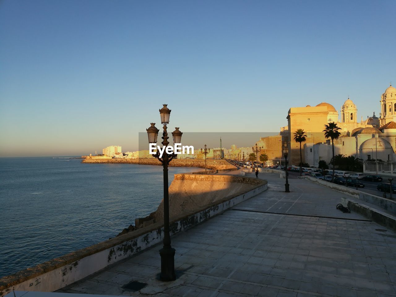 BUILT STRUCTURE ON SEA AGAINST CLEAR SKY