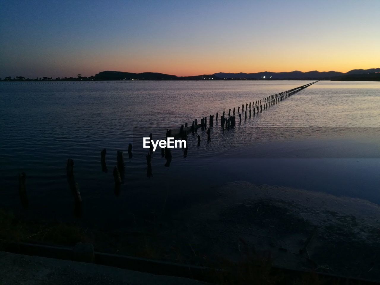 Scenic view of lake against clear sky