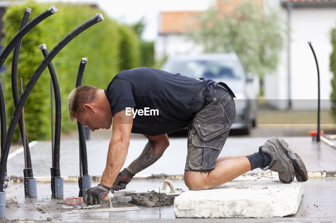 Man preparing concrete foundation