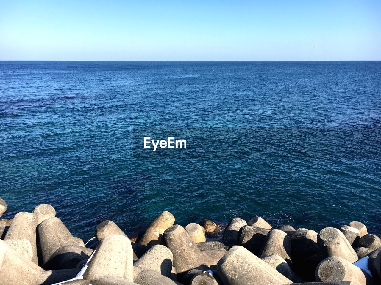 Scenic view of sea against clear sky