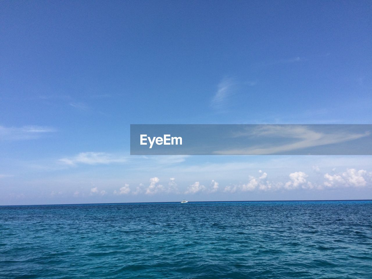 Scenic view of calm sea against sky