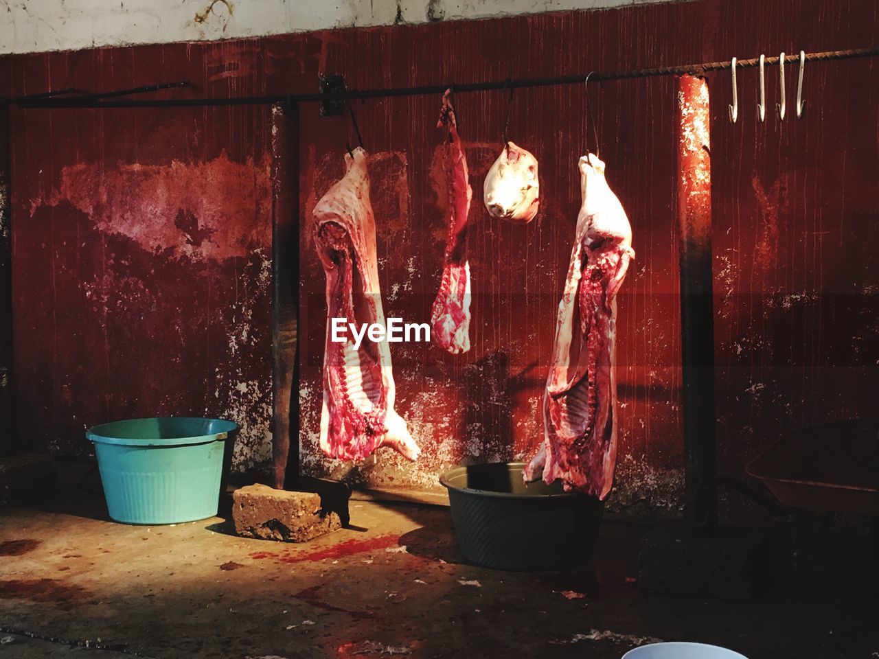 Meats hanging at butcher shop