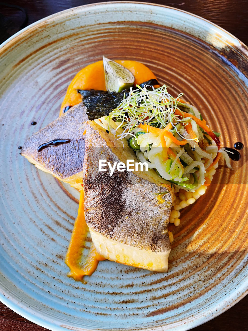 Close-up of food in plate on table