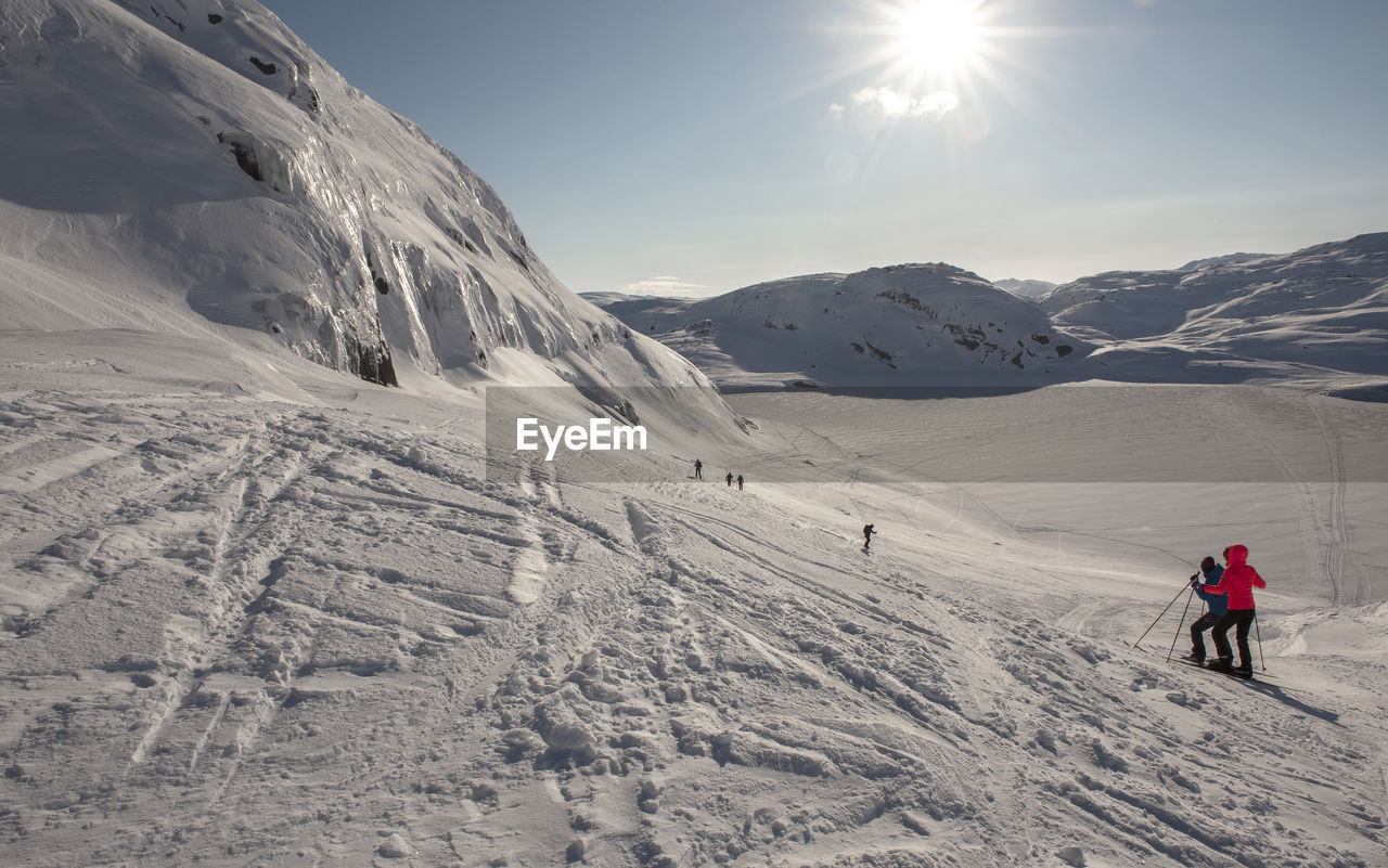 Scenic view of snow covered mountain against sky