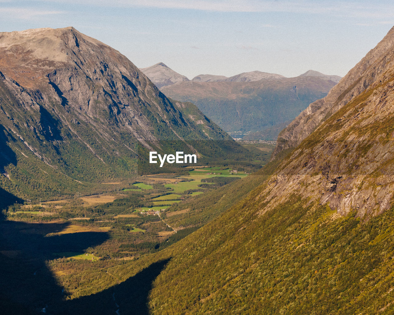 Massive mountain range with rock and forest