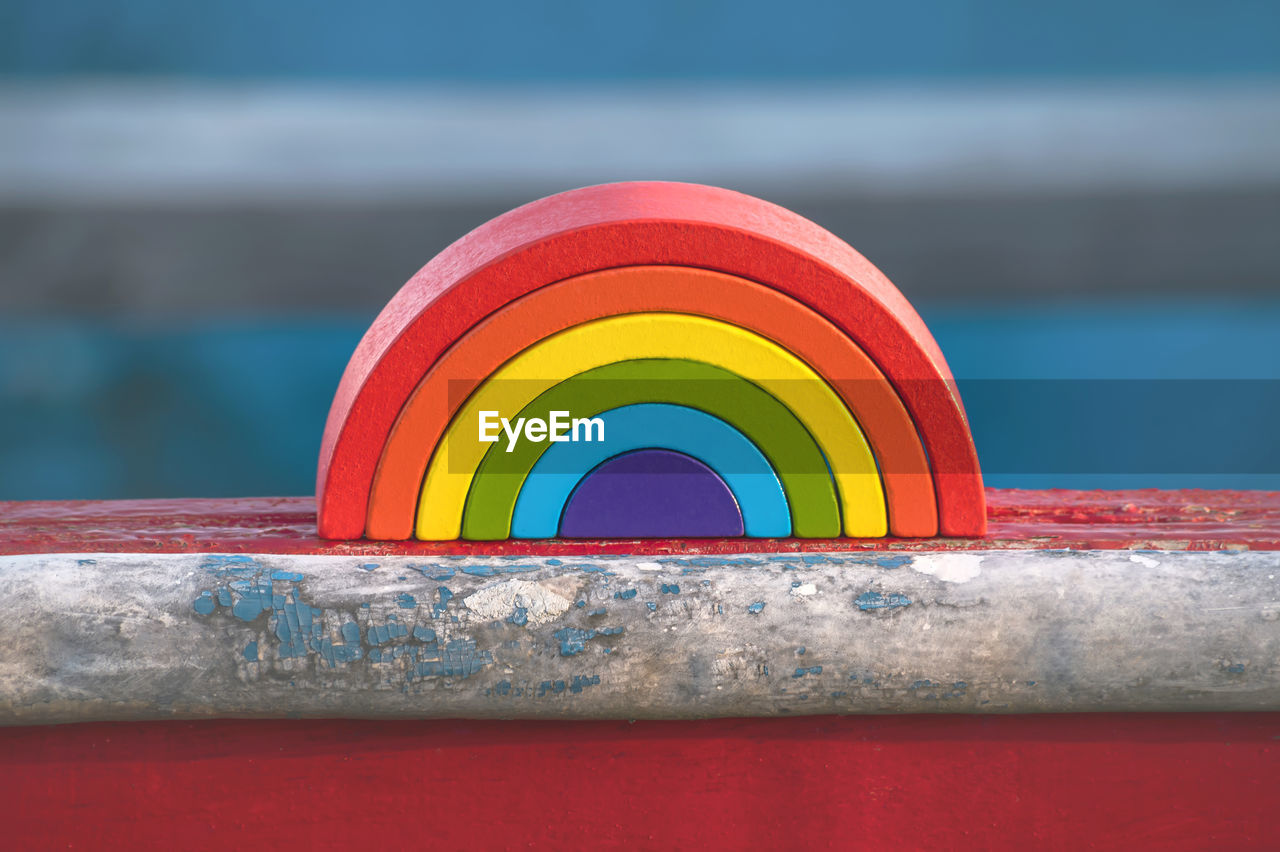 Close-up of multi colored rainbow on table