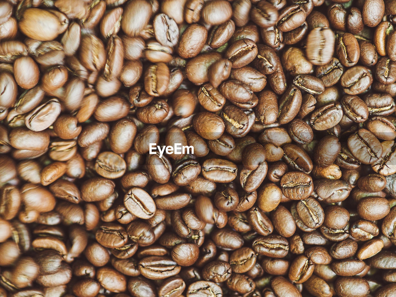 full frame shot of roasted coffee beans on table