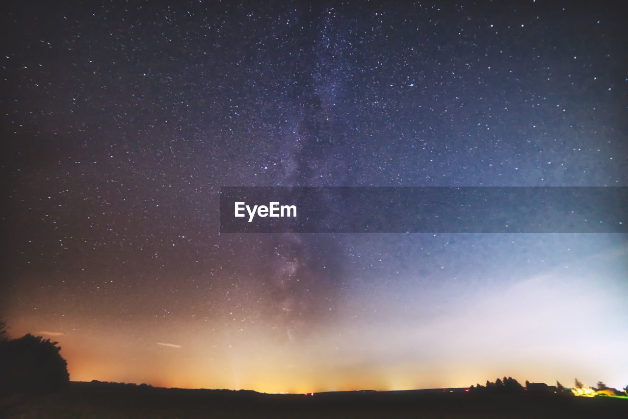 SCENIC VIEW OF STAR FIELD AGAINST SKY