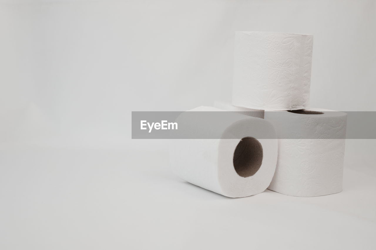 toilet paper, paper towel, paper, rolled up, cylinder, indoors, white, studio shot, no people, hygiene, copy space, single object, white background