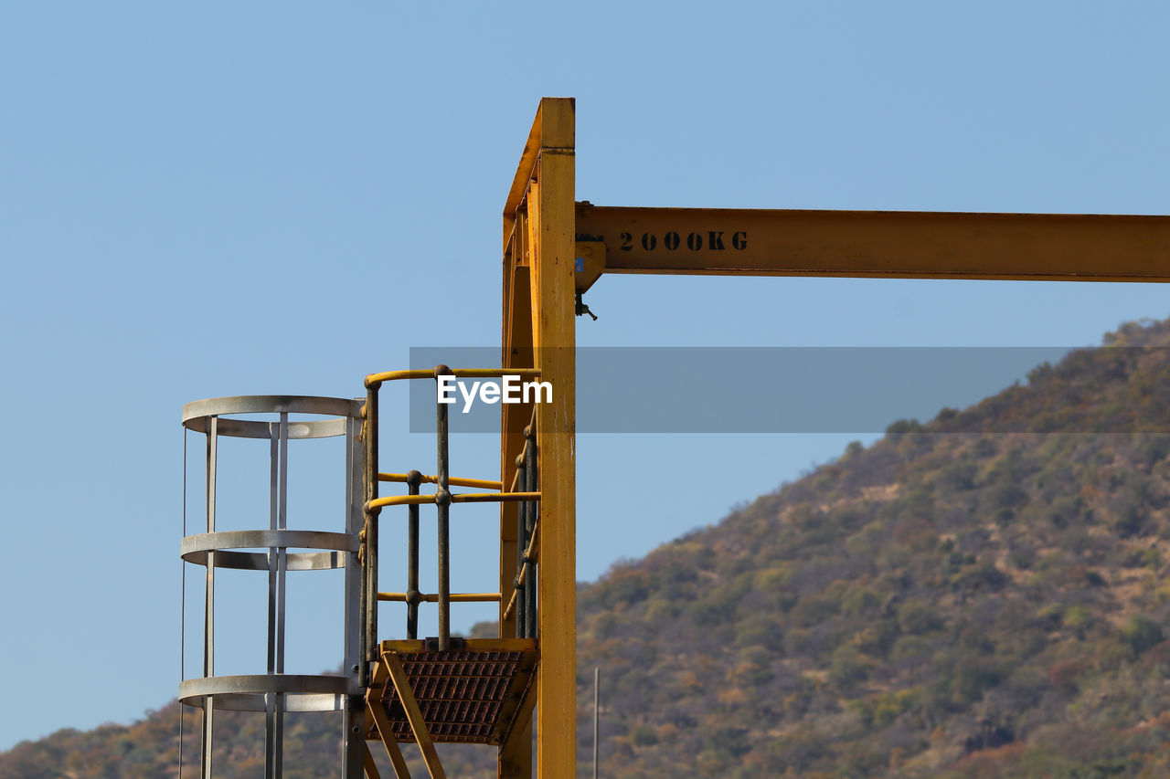 Industrial loading hoist structure with platform