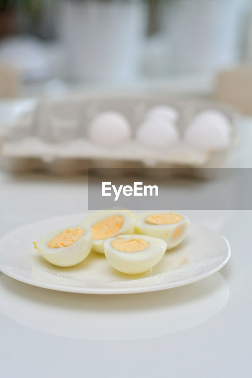 food and drink, food, egg, healthy eating, plate, freshness, wellbeing, indoors, breakfast, focus on foreground, no people, produce, meal, close-up, table, tableware, egg yolk, dish, dishware, white