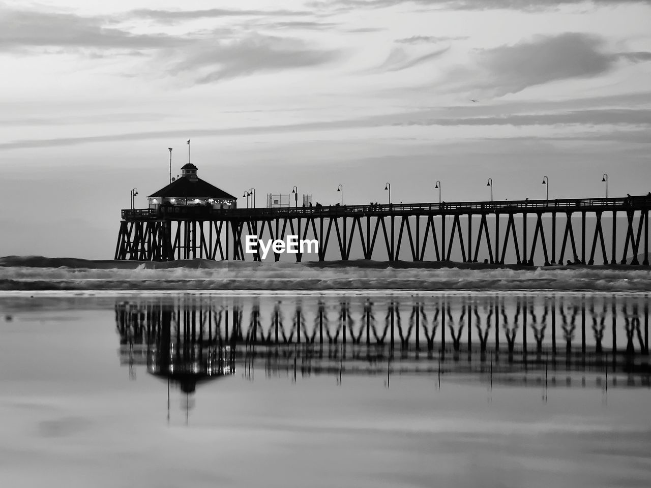 Pier over sea against sky