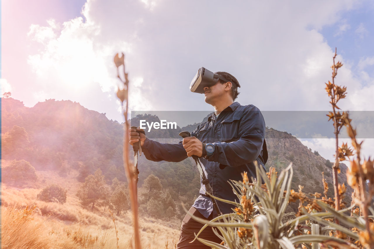 Hiker wearing virtual reality headset