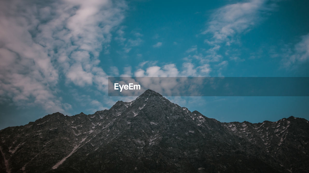 Low angle view of mountain against sky