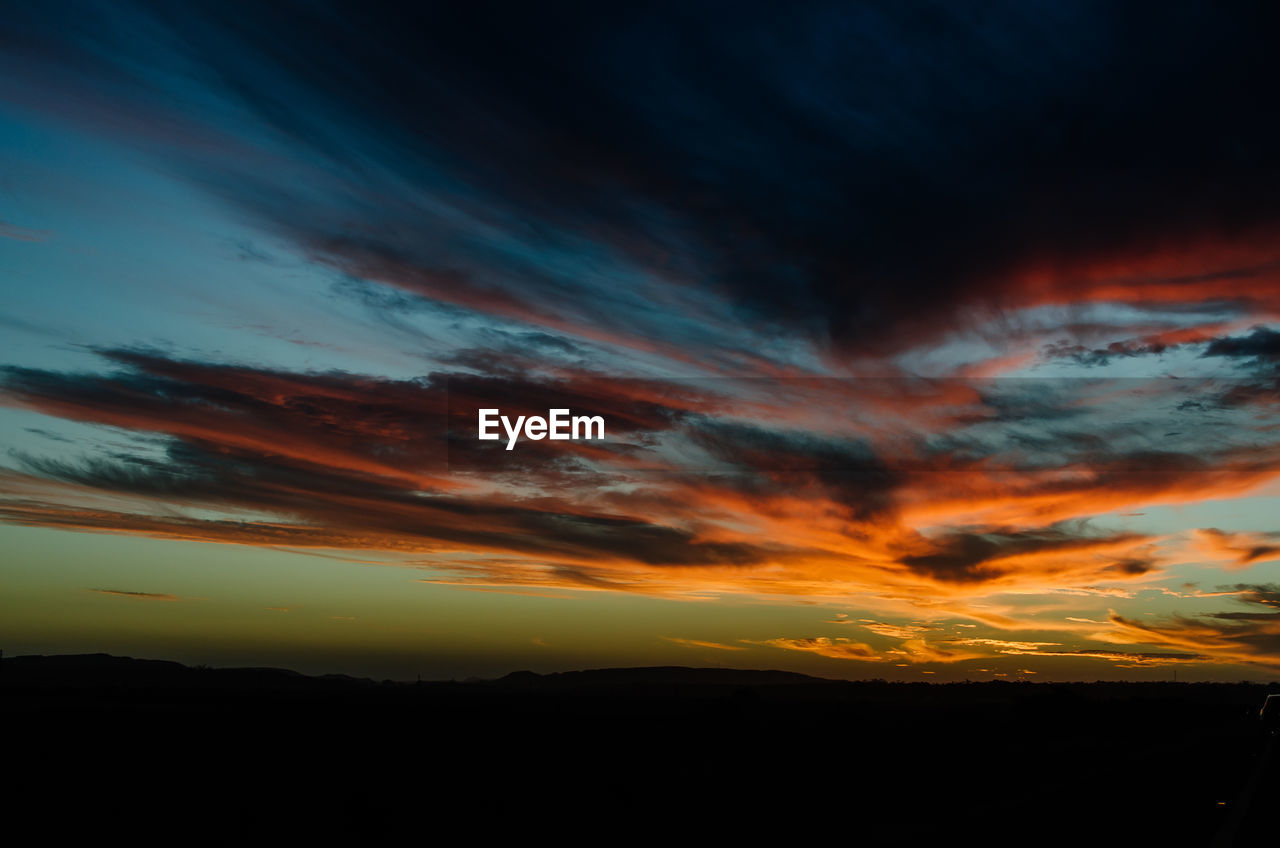 LOW ANGLE VIEW OF DRAMATIC SKY