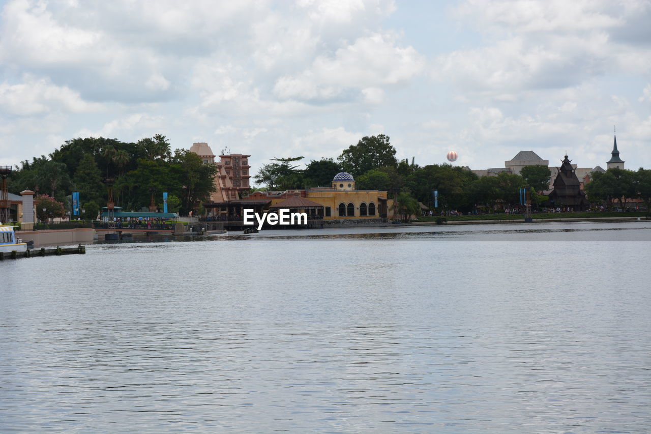 SCENIC VIEW OF RIVER BY BUILDING AGAINST SKY