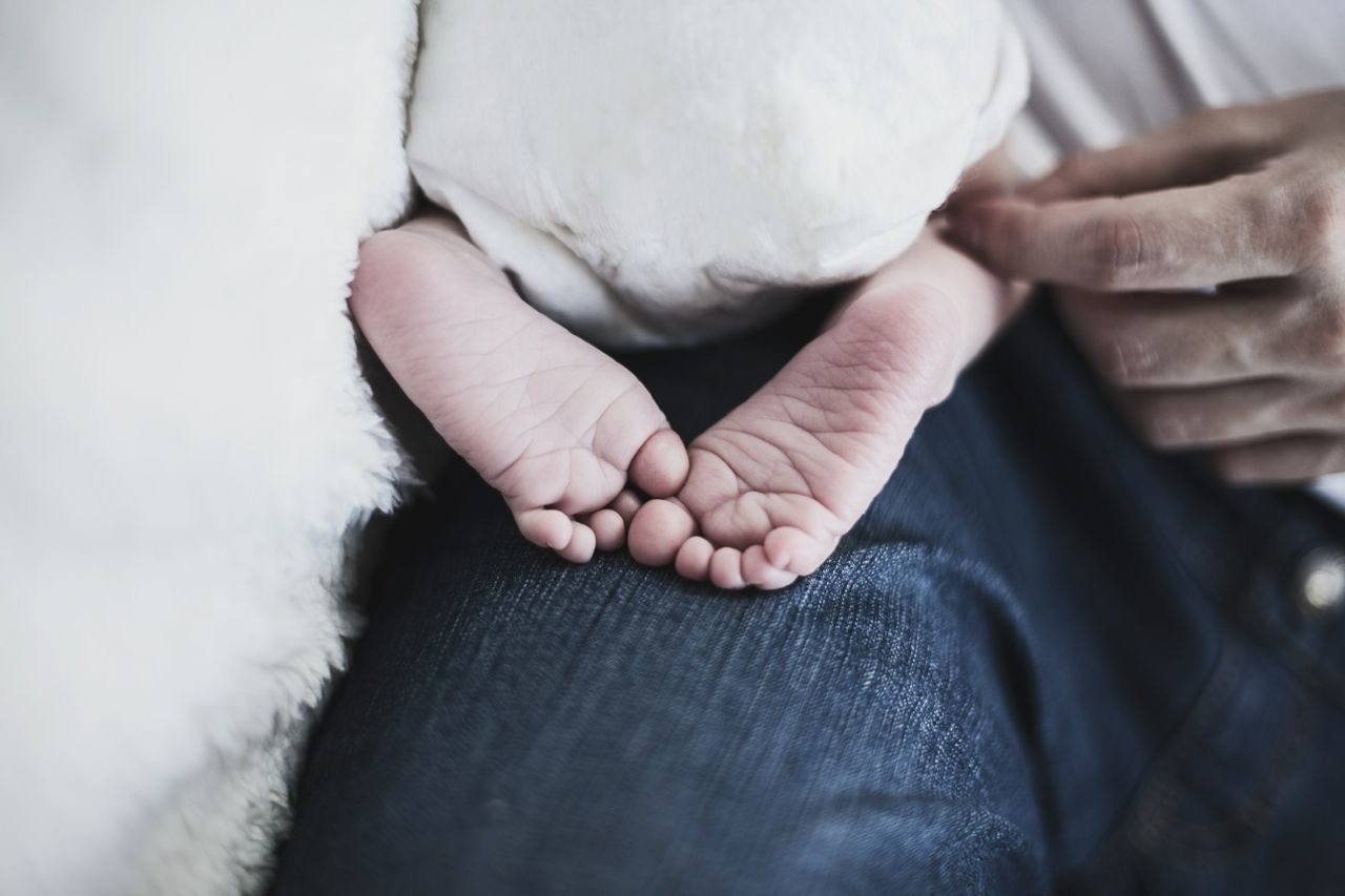 Cropped image of man with baby