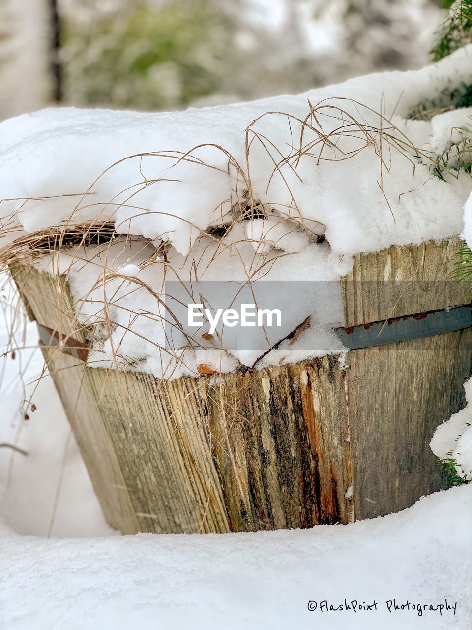 CLOSE-UP OF SNOW COVERED LAND ON FIELD