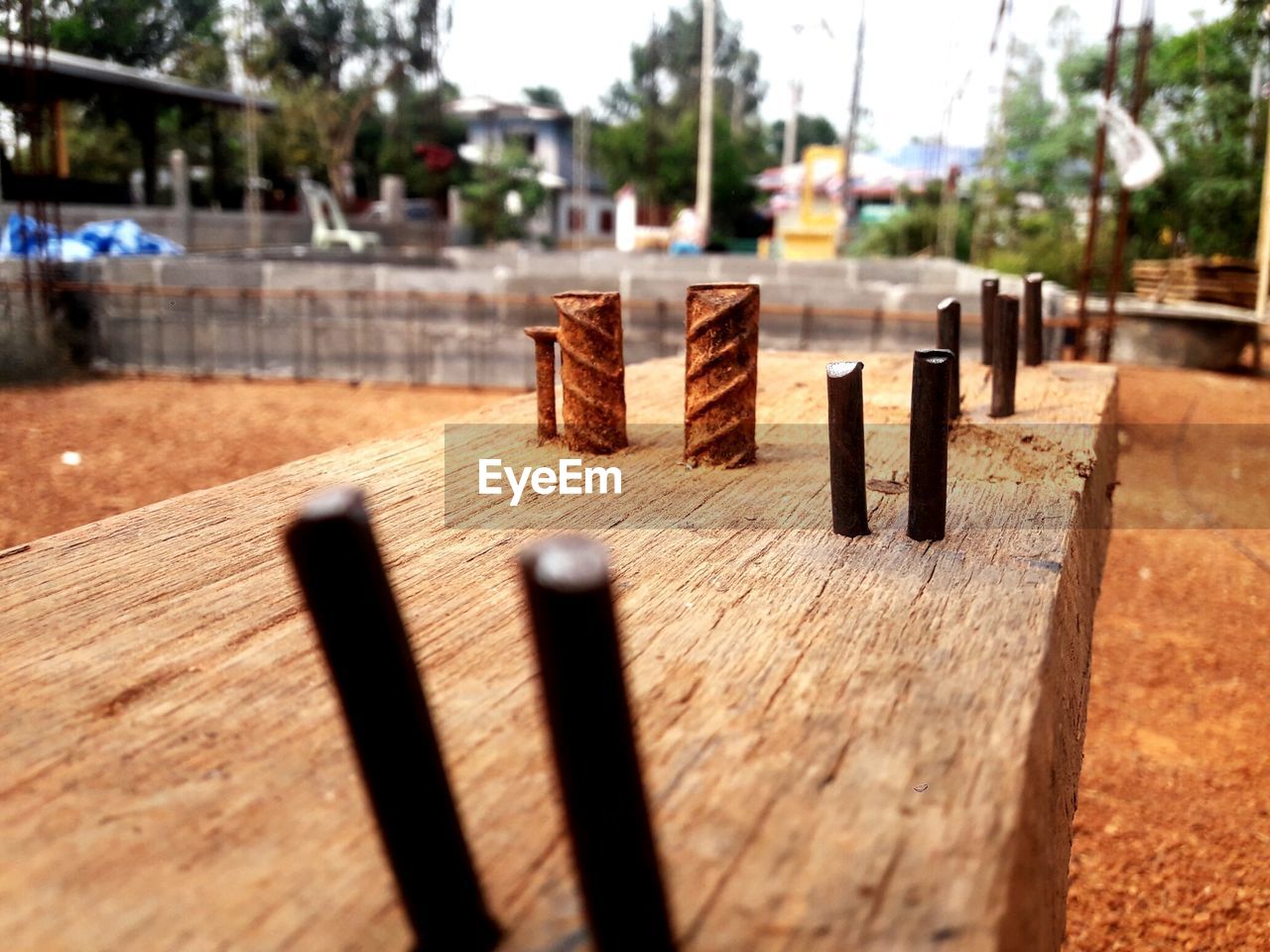 CLOSE-UP OF WOODEN TABLE AND CHAIRS