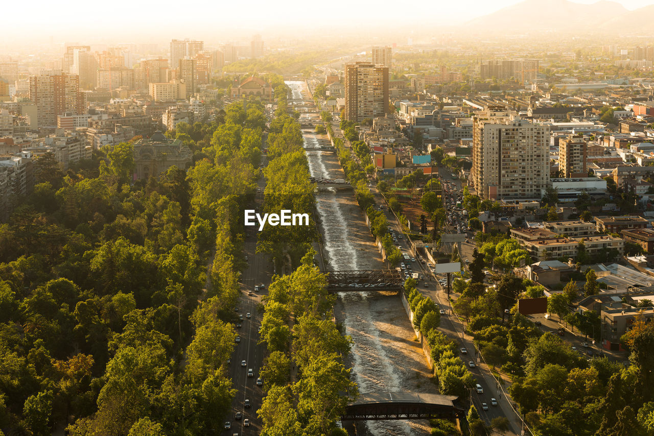 Mapocho river and forestal park  with the neighborhoods of patronato and bellavista, santiago, chile